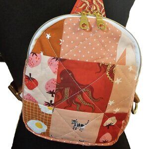Mav Sling Patchwork Mini Sling Backpack: Ruby Star Society Crossbody Bag
